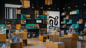 Contemporary cannabis store showcasing gardening products on wooden shelves.